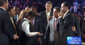 Pastor Rebecca Osorno at a healing service with Pastor Chris