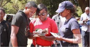 Kenyans receiving the Daily Devotional 