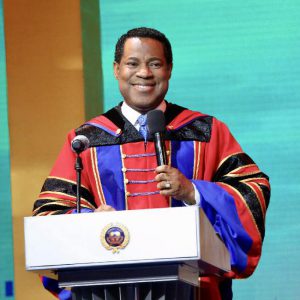 Pastor Chris ministers to the crowd at final service 